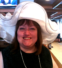 Website Designer Kathy Raymond of CT in a big hat during a KY Derby party.